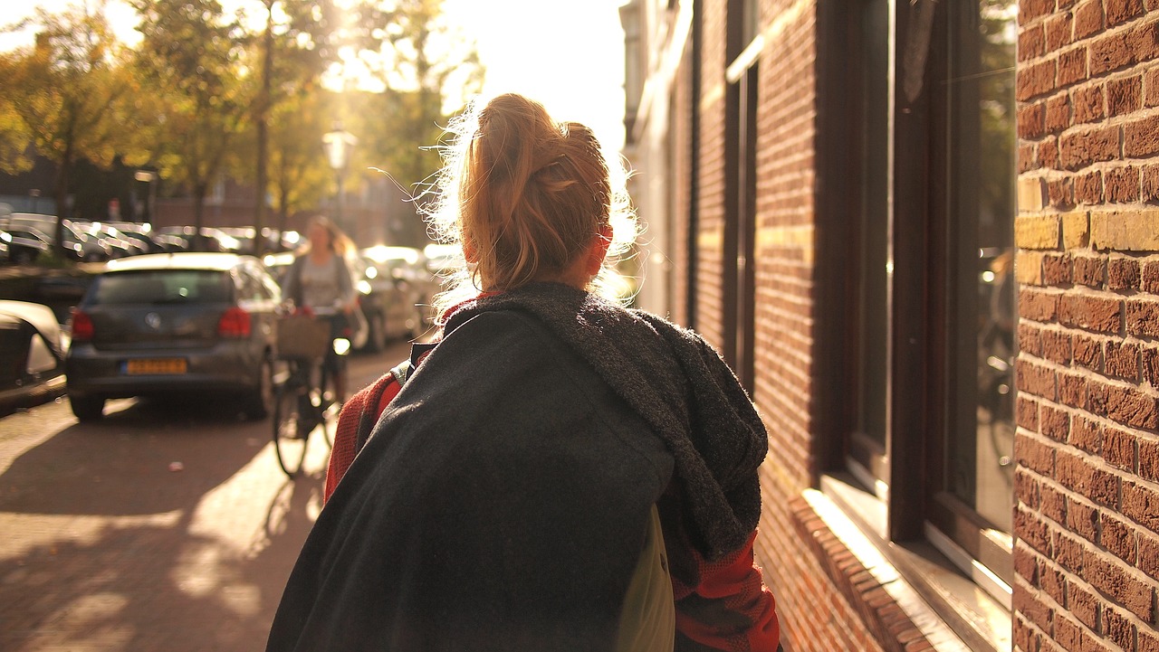 A woman walking down the street
