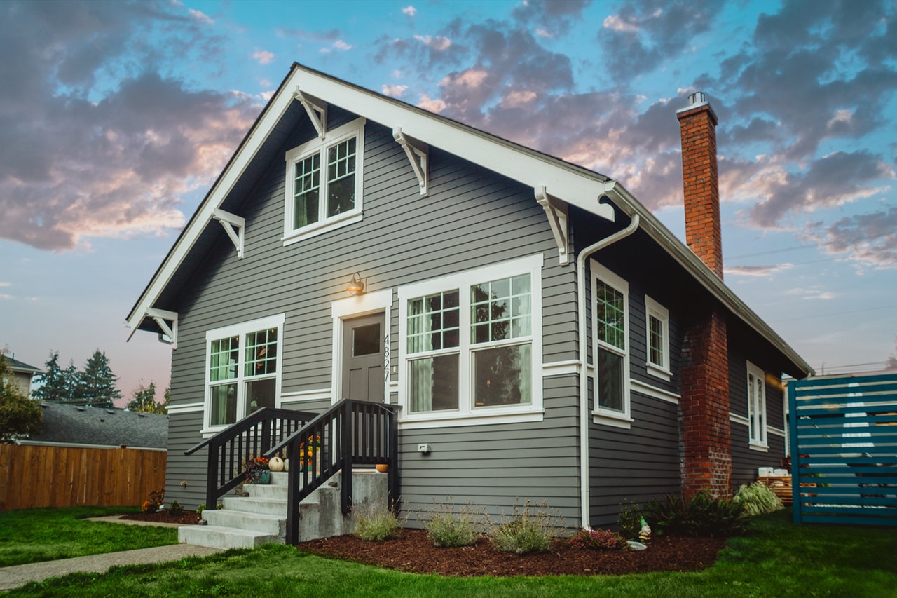 gray house under blue and gray sky 1569003